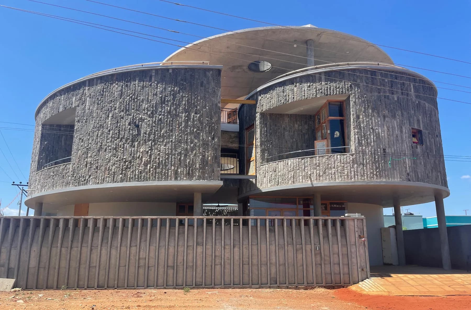Twin Curve House by Fifth Element Architecture